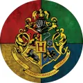 Kulatý jedlý obrázek na dort – Harry Potter, Bradavický znak se stuhou (červená, zelená, zlatá)