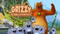 Obdélníkový jedlý obrázek na dort – Grizzy a lumíci, na lesní silnici u hor (hnědá, modrá, zelená)