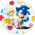 Kulatý jedlý obrázek na dort – Sonic, s Tailsem na geometrickém pozadí (modrá, žlutá, červená)