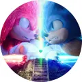 Kulatý jedlý obrázek na dort – Sonic, souboj s Knucklesem o smaragd (modrá, červená, zelená)