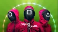 Obdélníkový jedlý obrázek na dort – Squid Game, strážci a zelené pozadí (červená, zelená, černá)