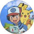 Kulatý jedlý obrázek na dort – Pokémon, Ash s Pikachu na rameni a přátelé (modrá, žlutá, červená)