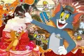 Obdélníkový jedlý obrázek na dort – Tom a Jerry, Tom v čepici a velký dort (modrá, červená, žlutá)
