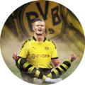 Kulatý jedlý obrázek na dort – Erling Haaland, zenová pozice v dresu BVB (žlutá, černá, bílá)
