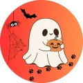 Kulatý jedlý obrázek na dort – Halloween, duch držící dýni (žlutá, bílá, černá)