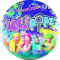 Kulatý jedlý obrázek na dort – Lollipopz, modré pozadí s cákanci (modrá, duhová, růžová)