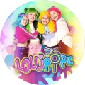 Kulatý jedlý obrázek na dort – Lollipopz, objetí na duhovém pozadí (růžová, modrá, zelená)