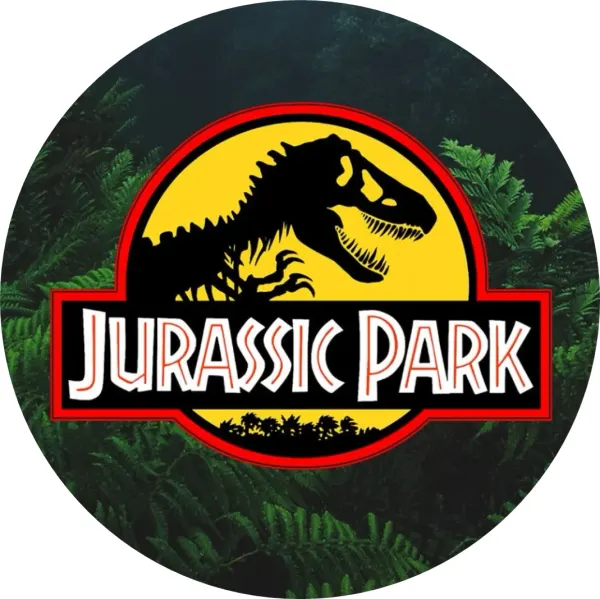 Kulatý jedlý obrázek na dort – Dinosaurus, Jurassic Park logo v kapradí (zelená, černá, žlutá)
