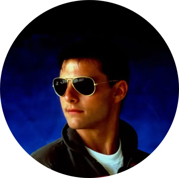 Kulatý jedlý obrázek na dort – Top Gun, portrét pilota v brýlích a bundě (modrá, černá, hnědá)