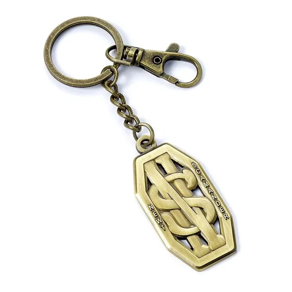 Kovová klíčenka Fantastická zvířata - Mlok Scamander Logo |