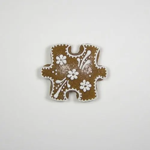 Nerezové vykrajovátko ve tvaru puzzle z lesklé nerezové oceli, rozměr 46 x 51 mm